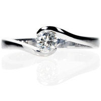 Solitaire diamond engagement ring